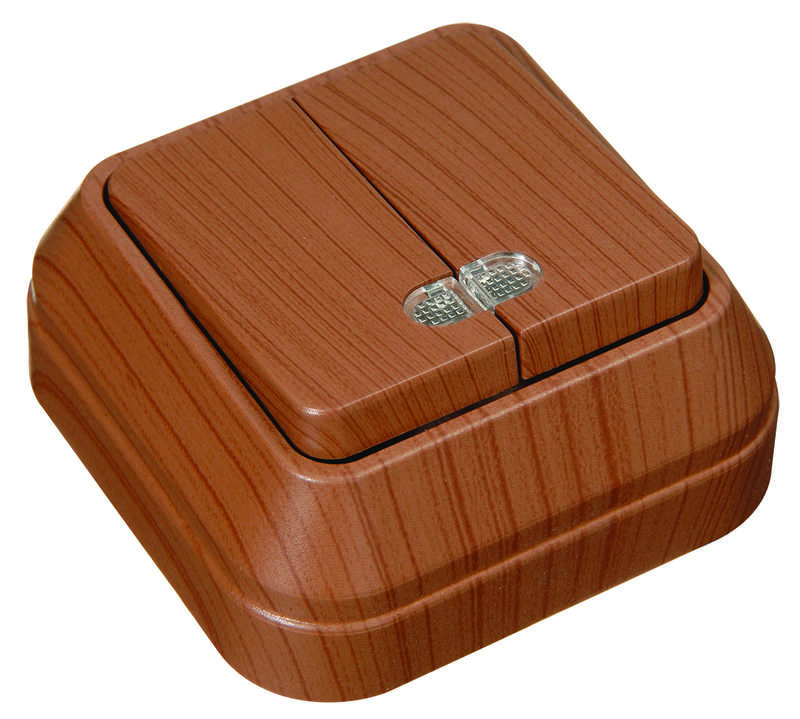 Выключатель 2-кл. ОП 10А IP20 с подсветкой орех Makel 45423