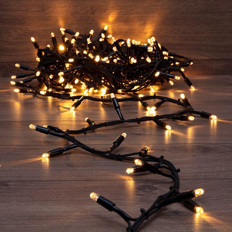 Гирлянда светодиодная "Кластер" 10м 200LED тепл. бел. 18Вт IP67 соединяемая провод каучук черн. Neon-Night 315-256