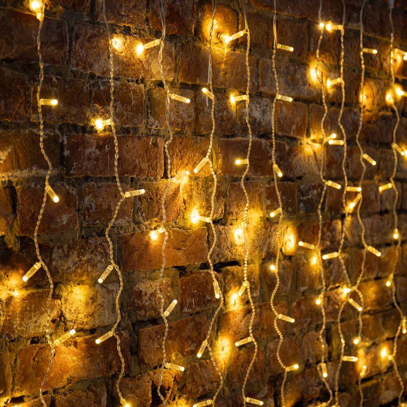 Гирлянда светодиодная "Светодиодный Дождь" 2х3м 448LED тепл. бел. 66Вт 230В IP65 постоян. свечение провод прозр. (нужен шнур питания 303-500-1) Neon-Night 235-156-6