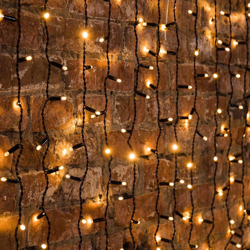 Гирлянда светодиодная "Дождь" 2х0.8м 160LED тепл. бел. 10Вт 230В IP65 эффект мерцания провод черн. (нужен шнур питания 303-500) Neon-Night 235-356