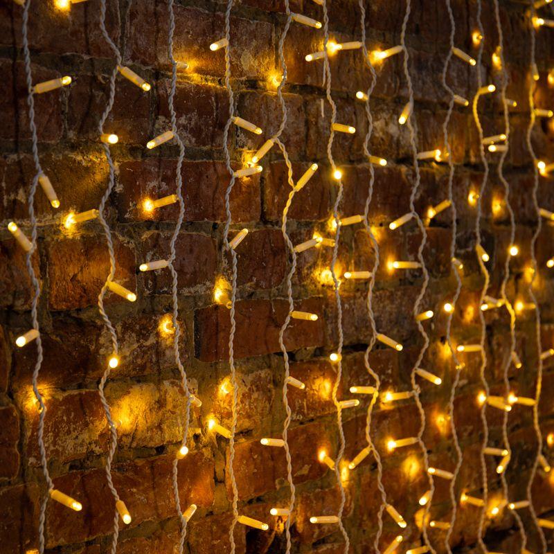 Гирлянда светодиодная "Дождь" 2х3м 600LED тепл. бел. 80Вт 230В IP65 эффект мерцания провод бел. (нужен шнур питания 303-500-1) Neon-Night 235-366