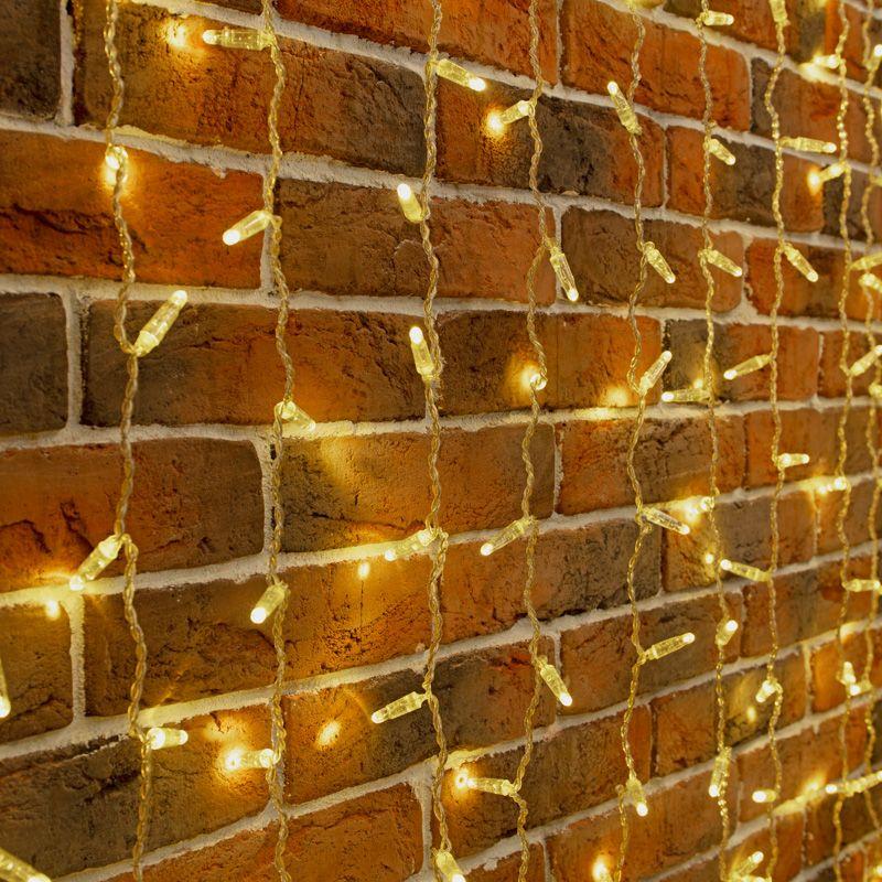 Гирлянда светодиодная "Дождь" 2х6м 768LED тепл. бел. 70Вт 230В IP65 эффект мерцания провод прозр. (партия 2020 - 768LED) Neon-Night 235-386